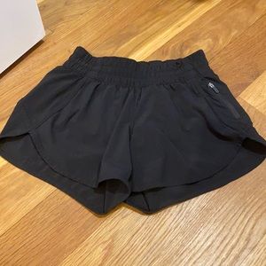 size six four inch lululemon tracker shorts.